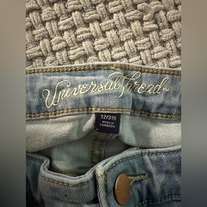 Size 12 universal thread jeans. Distressed knees.